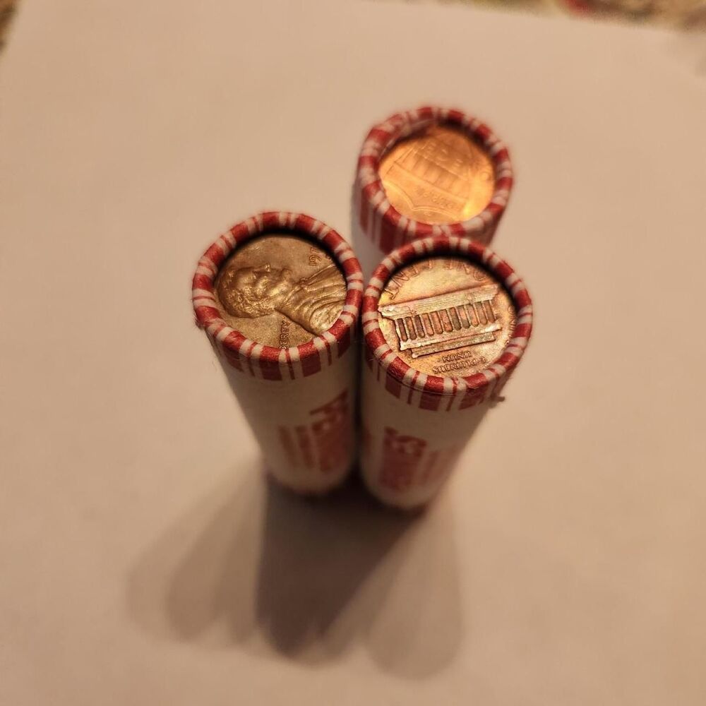 LOT OF THREE ROLLS OF PENNIES